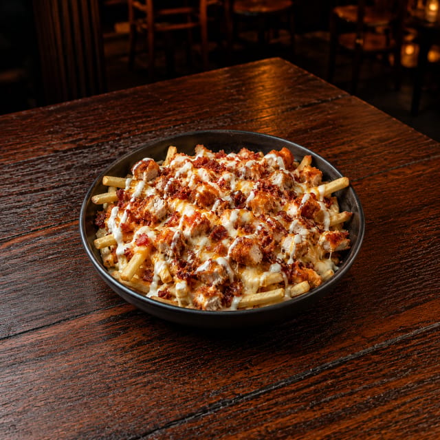 Hot Honey Chicken Bacon Ranch Loaded Fries.